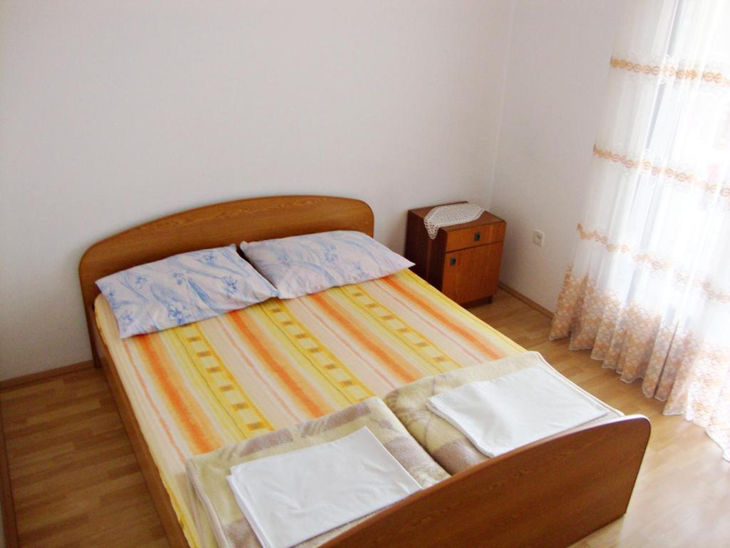 Posteľ alebo postele v izbe v ubytovaní Apartments by the sea Podaca, Makarska - 2612