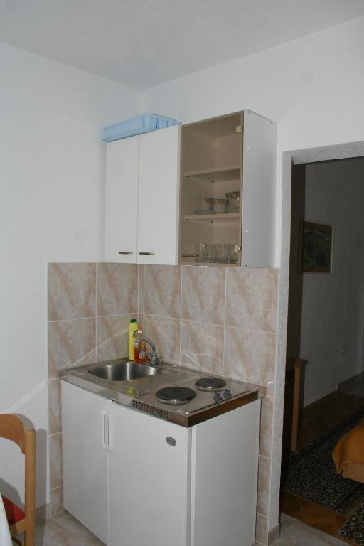 Kuchyň nebo kuchyňský kout v ubytování Apartments by the sea Igrane, Makarska - 2679