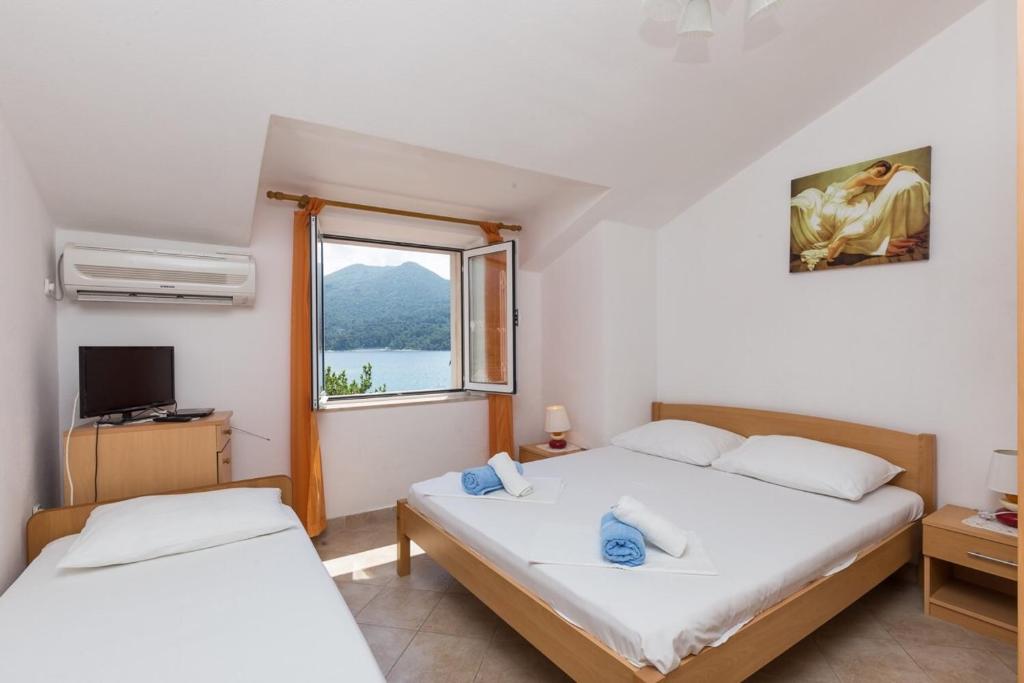 Fotografia z galérie ubytovania Apartments and rooms by the sea Slano, Dubrovnik - 2687 v Slano