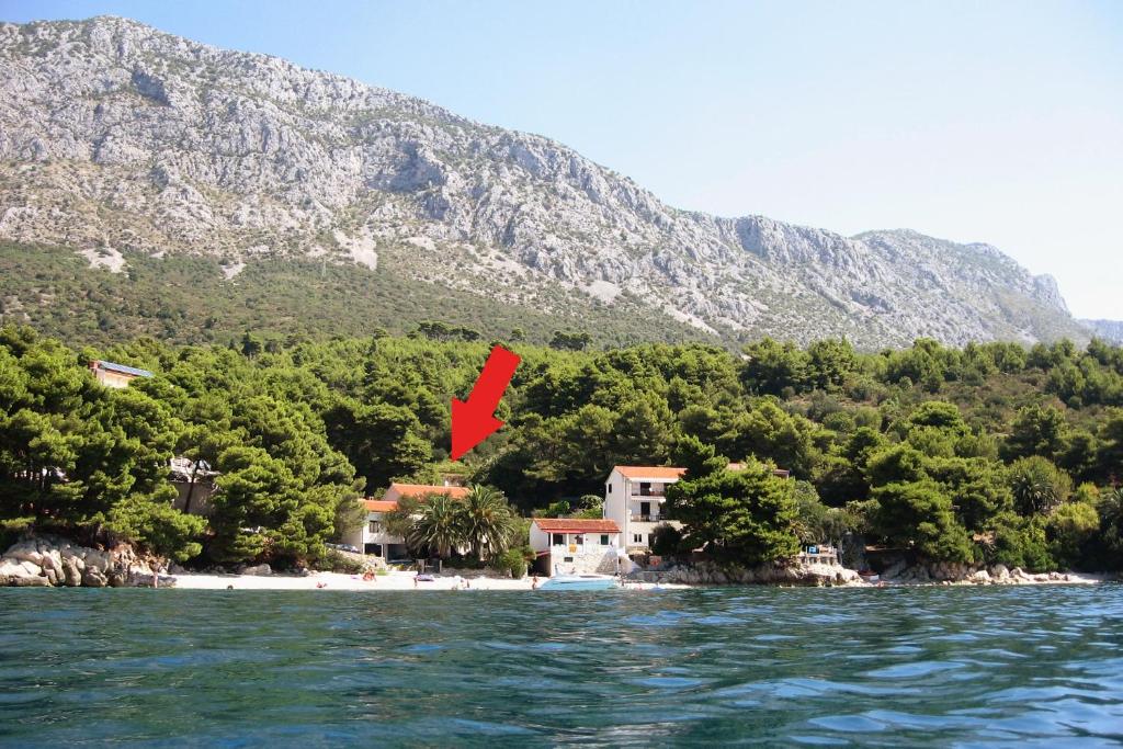 a view of a resort from the water at Apartment Zaostrog 2625a in Zaostrog