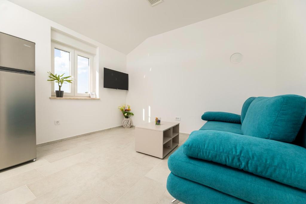 Телевизор и/или развлекательный центр в Apartments Sucic 2
