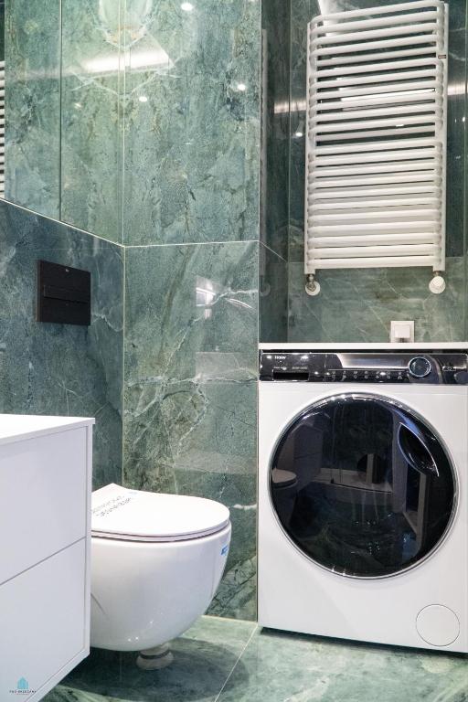 Kúpeľňa v ubytovaní Pod Brzozami Apartamenty Let's Sea Gąski