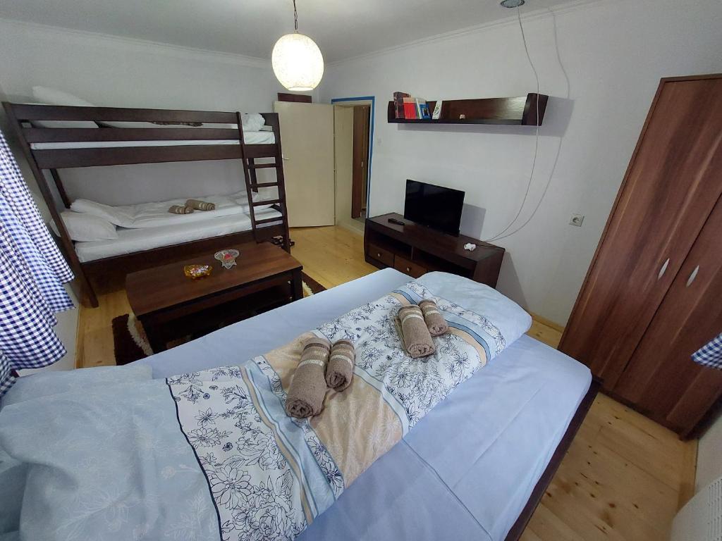 Postel nebo postele na pokoji v ubytování Seosko domaćinstvo Alababa
