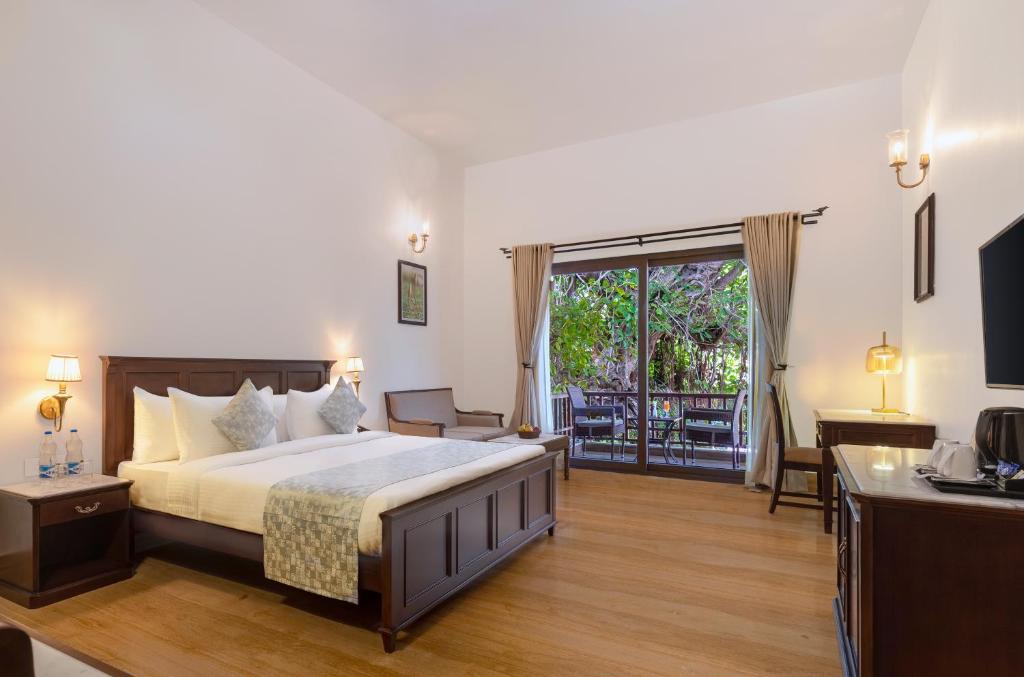 Postel nebo postele na pokoji v ubytování Sarasiruham Resort - Private Pool Villa in Udaipur