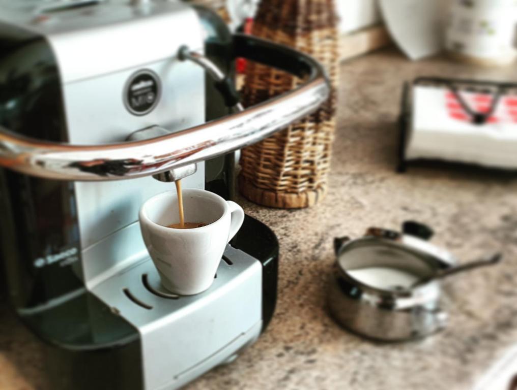 Coffee and tea making facilities at Tranquillità e comodità a due passi dal centro