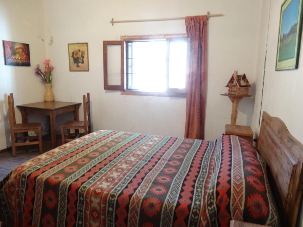 Postel nebo postele na pokoji v ubytování Tree House Hostel