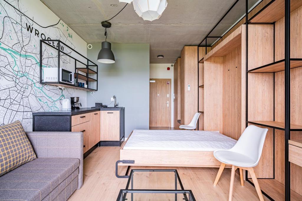 Kuchyňa alebo kuchynka v ubytovaní RentPlanet - Apartamenty Zarembowicza