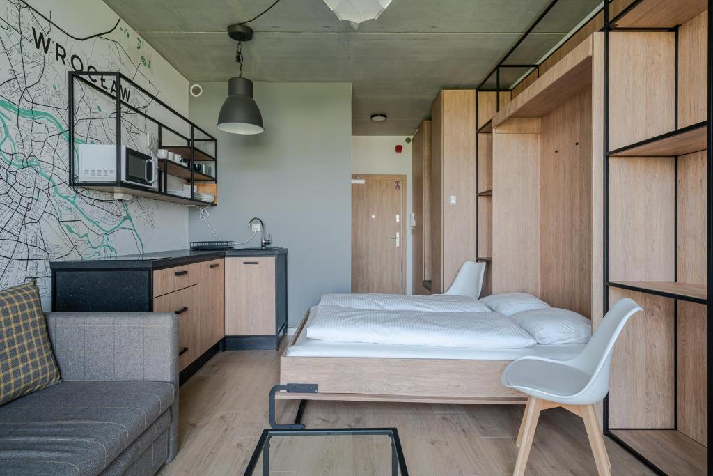 Posteľ alebo postele v izbe v ubytovaní RentPlanet - Apartamenty Zarembowicza