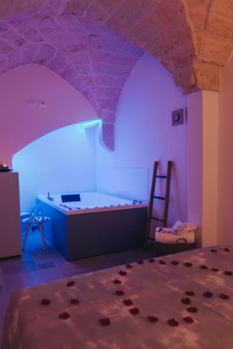 Postel nebo postele na pokoji v ubytování Suite Matteotti