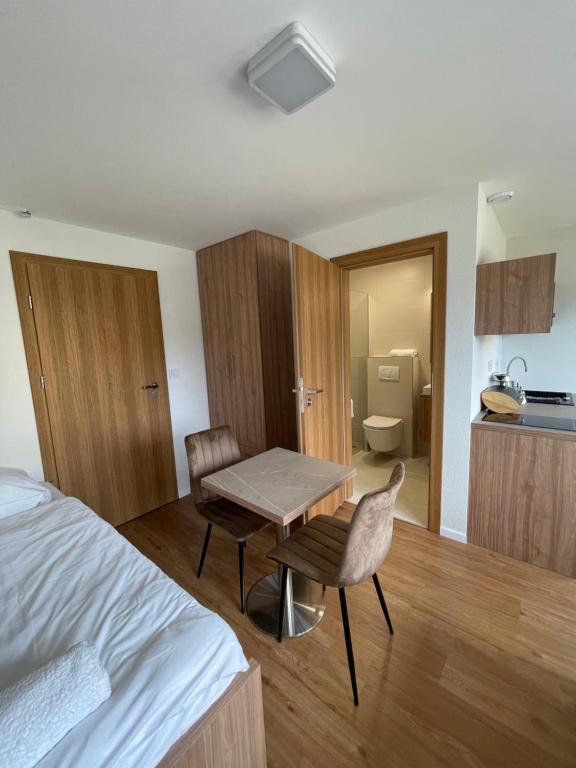 Kuchyň nebo kuchyňský kout v ubytování Apartmotel ANROE