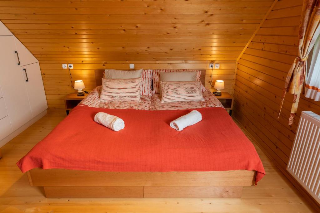 Postel nebo postele na pokoji v ubytování Chalet Ajda