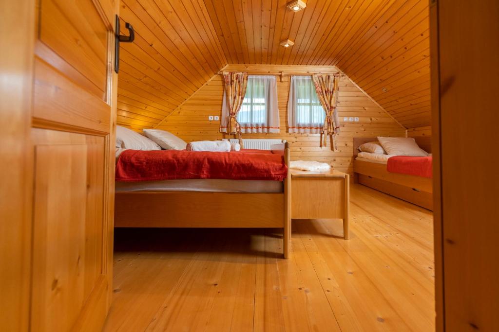 Postel nebo postele na pokoji v ubytování Chalet Ajda