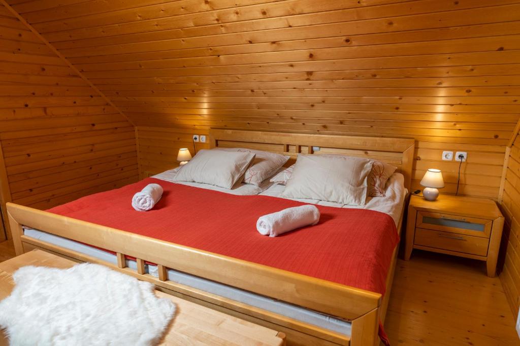 Postel nebo postele na pokoji v ubytování Chalet Ajda