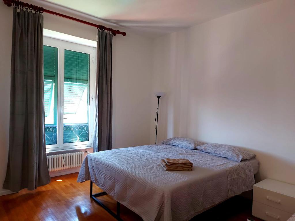 Postel nebo postele na pokoji v ubytování La dulce stanza