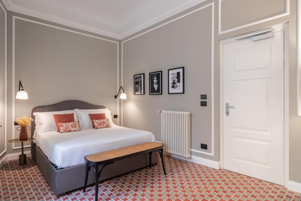 Postel nebo postele na pokoji v ubytování Vossia Luxury Rooms & Sicilian Living