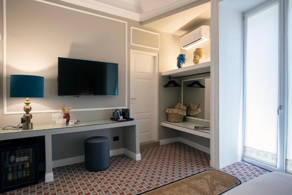 Kuchyň nebo kuchyňský kout v ubytování Vossia Luxury Rooms & Sicilian Living