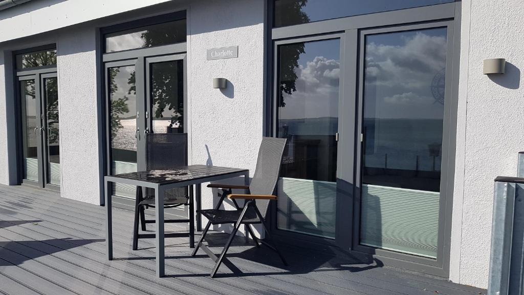 Balkón nebo terasa v ubytování Strandappartement Steinberghaff "Charlotte" mit Meerblick