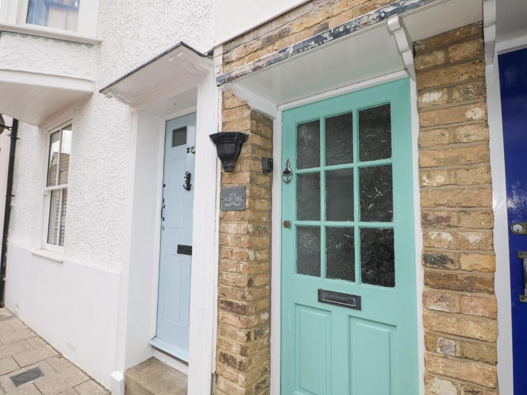 a front door of a house with a blue door at High Tide in Herne Bay