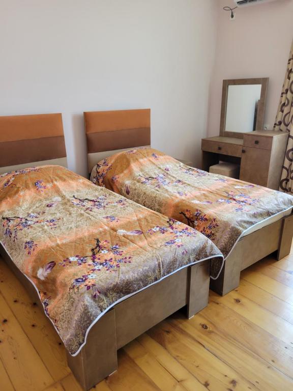 Ένα ή περισσότερα κρεβάτια σε δωμάτιο στο guest house TSVARA