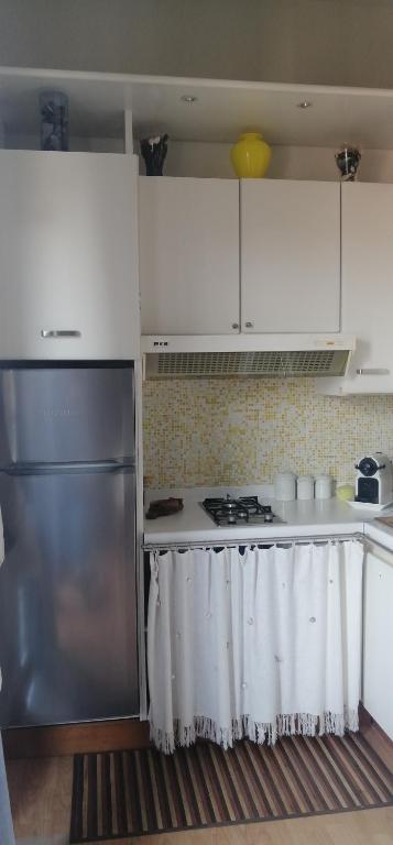 A kitchen or kitchenette at Studio via Matteotti