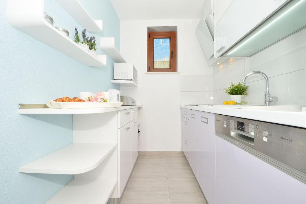 Fotografia z galérie ubytovania Apartments for families with children Seget Vranjica, Trogir - 2976 v Donji Seget