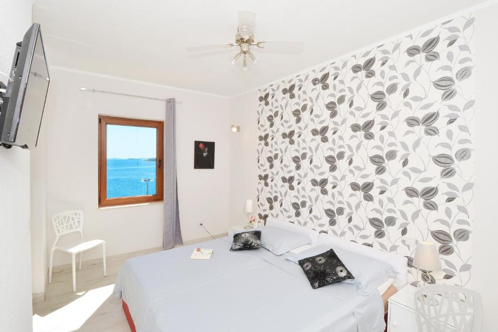 Fotografia z galérie ubytovania Apartments for families with children Seget Vranjica, Trogir - 2976 v Donji Seget