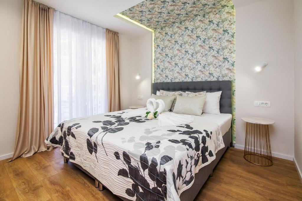 Posteľ alebo postele v izbe v ubytovaní Apartments and rooms by the sea Lokva Rogoznica, Omis - 2973