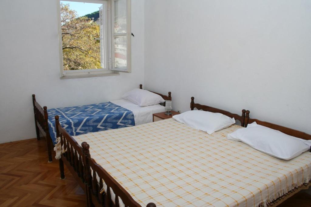 Posteľ alebo postele v izbe v ubytovaní Apartments by the sea Pucisca, Brac - 2942