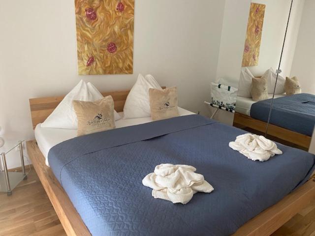 Posteľ alebo postele v izbe v ubytovaní Quality See Apartments Reifnitz