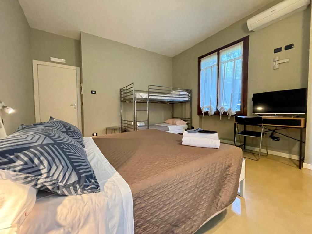Postel nebo postele na pokoji v ubytování B&B Aurora