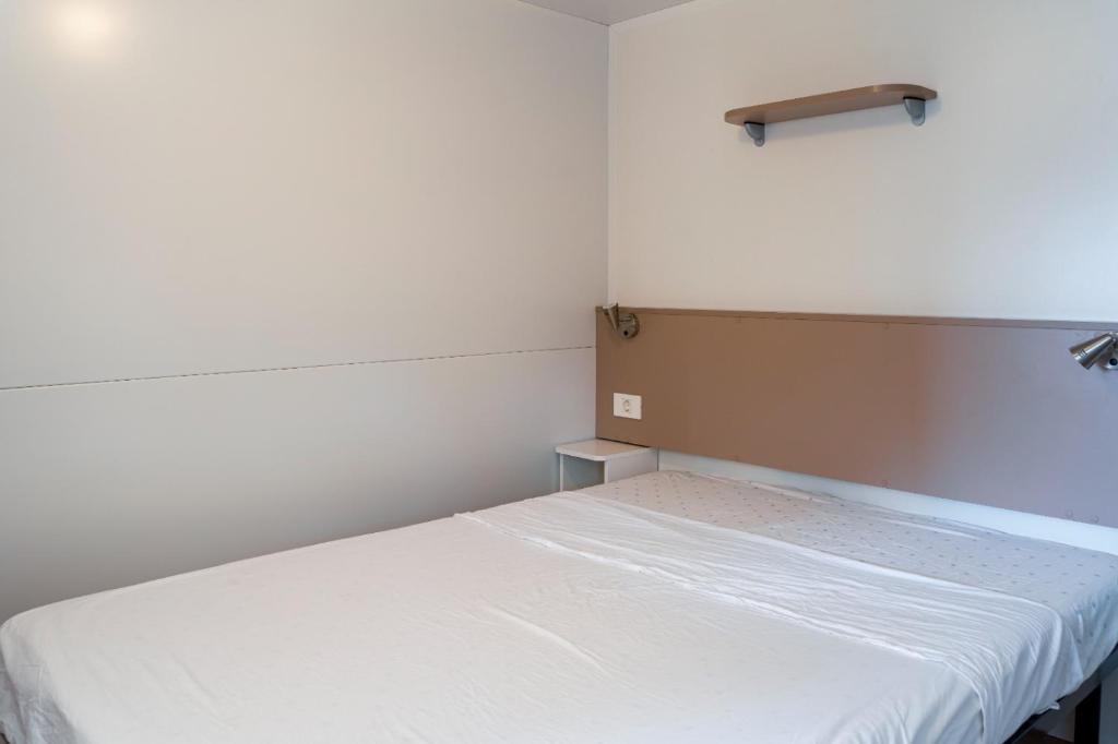 Postel nebo postele na pokoji v ubytování Camping Daino