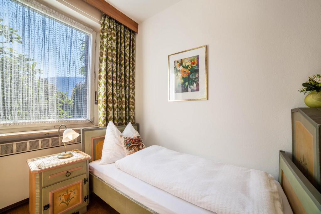 Posteľ alebo postele v izbe v ubytovaní Villa Coris Ferienwohnung Palma