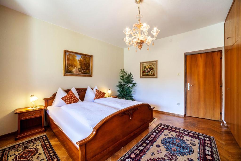 Posteľ alebo postele v izbe v ubytovaní Villa Coris Ferienwohnung Palma