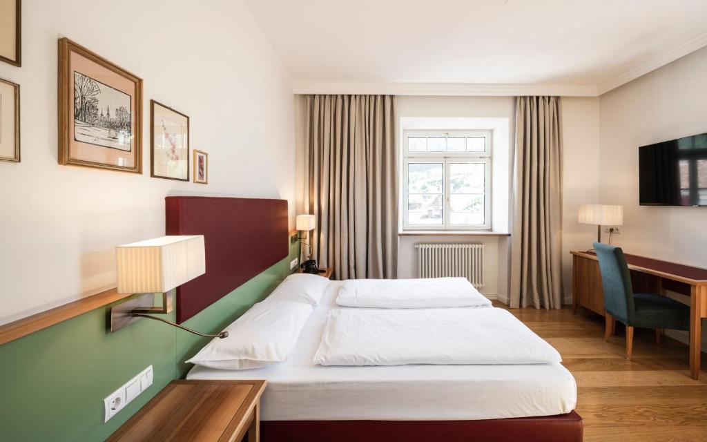 Postel nebo postele na pokoji v ubytování Classic Hotel Am Stetteneck