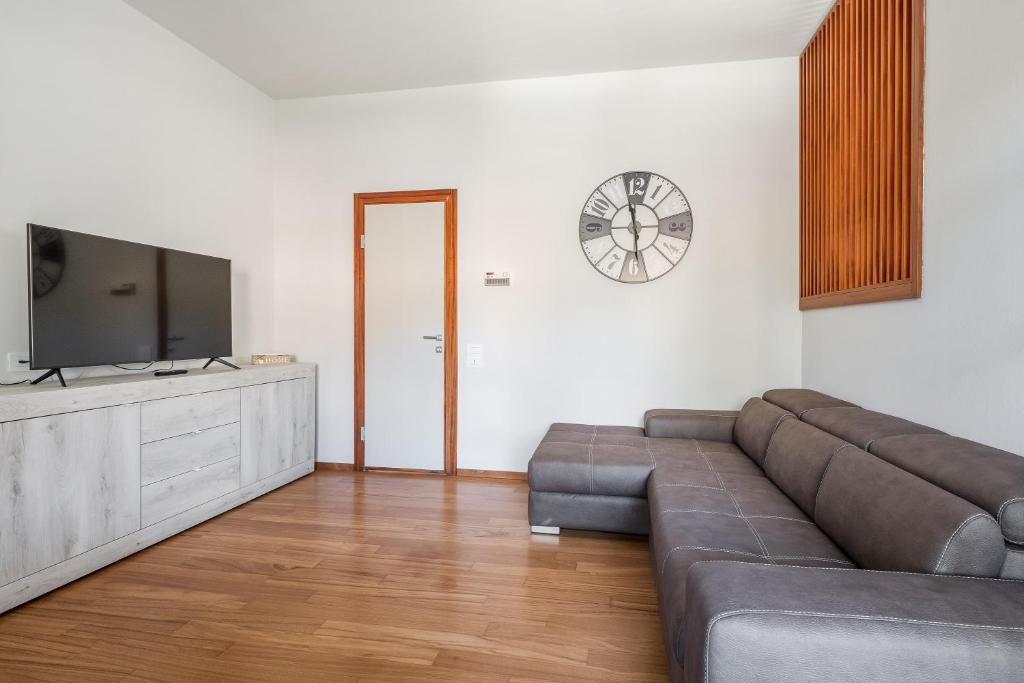 Televízia a/alebo spoločenská miestnosť v ubytovaní Tagliacozzi Suite Apartment