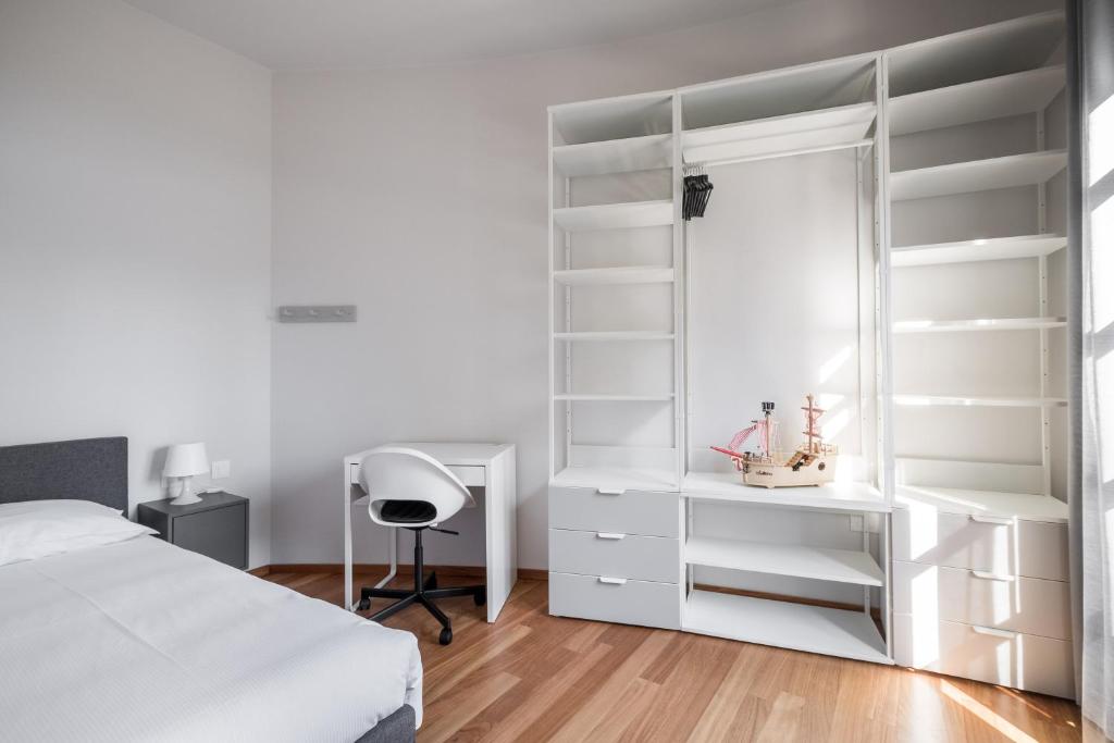Posteľ alebo postele v izbe v ubytovaní Tagliacozzi Suite Apartment
