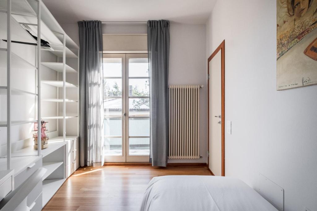 Posteľ alebo postele v izbe v ubytovaní Tagliacozzi Suite Apartment