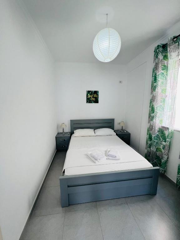 Ένα ή περισσότερα κρεβάτια σε δωμάτιο στο TERRACE VIEW APARTMENTS