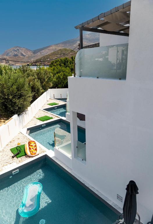 The swimming pool at or close to SKYROS BLUE SUITES