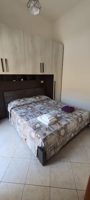 A bed or beds in a room at Casetta 144A