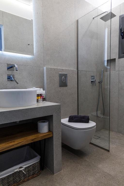 A bathroom at SKYROS BLUE SUITES