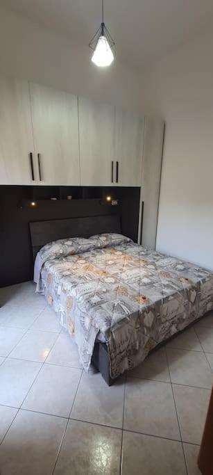 A bed or beds in a room at Casetta 144A