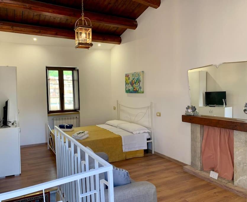 Postel nebo postele na pokoji v ubytování B&B Nonno Loreto