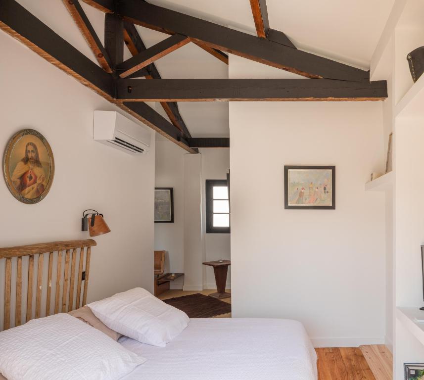 Postel nebo postele na pokoji v ubytování Auberge hiribarren
