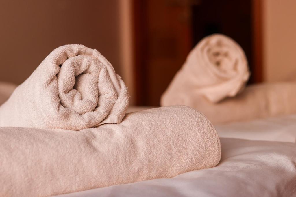 a close up of a towel on a bed at Stan na dan Sebastijan in Banja Luka