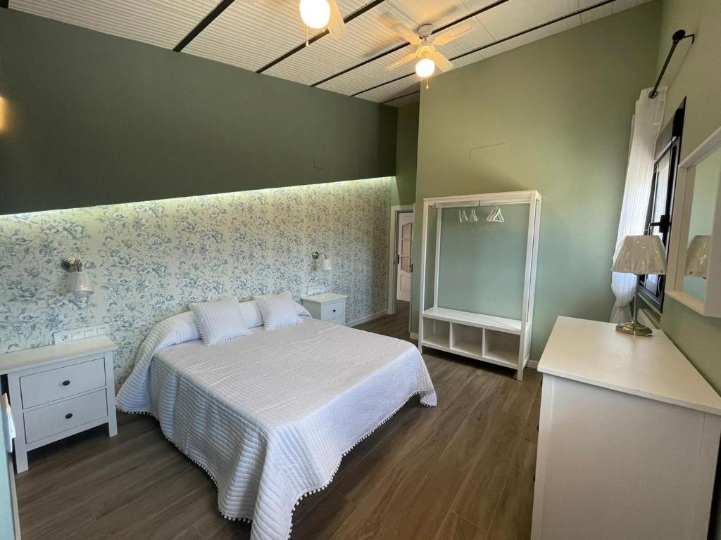Postel nebo postele na pokoji v ubytování Caserío de Charca Cuca