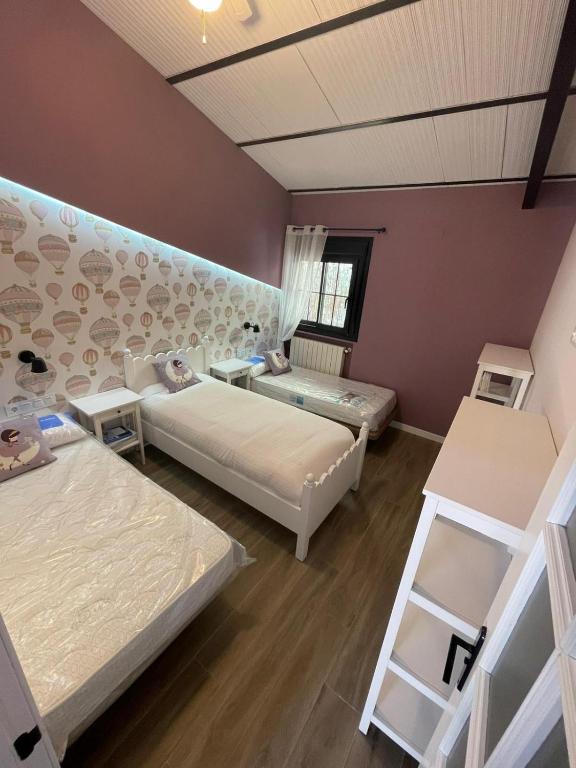 Postel nebo postele na pokoji v ubytování Caserío de Charca Cuca
