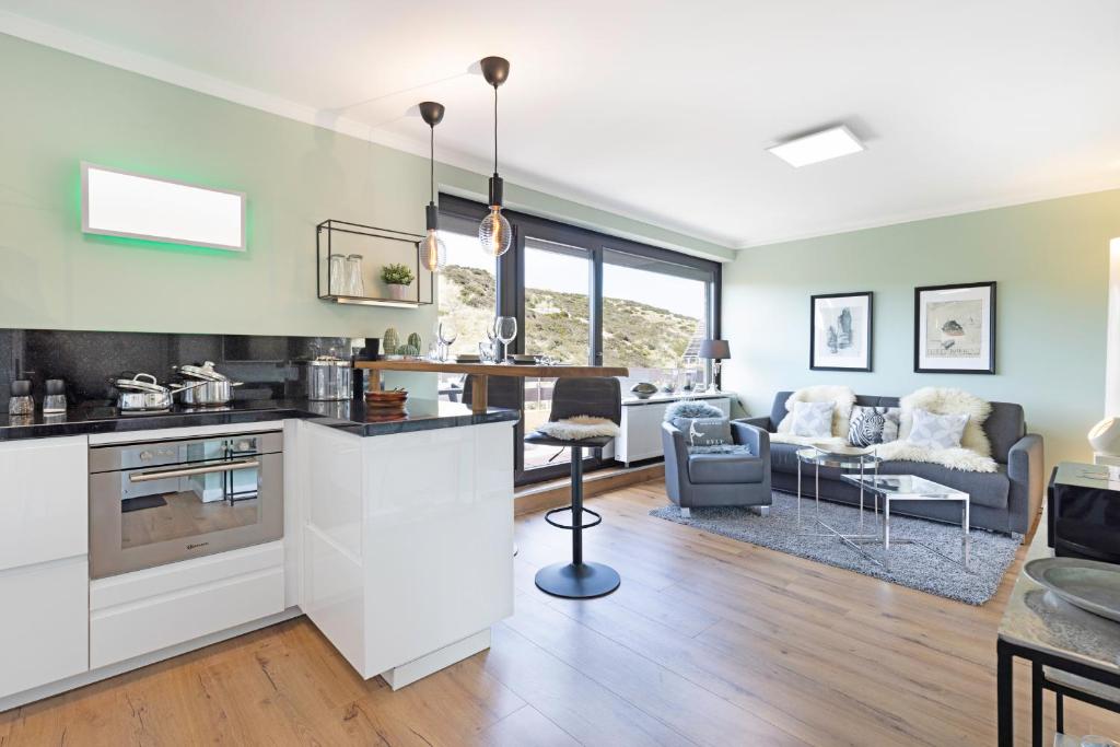 Kuchyň nebo kuchyňský kout v ubytování Dünenloft