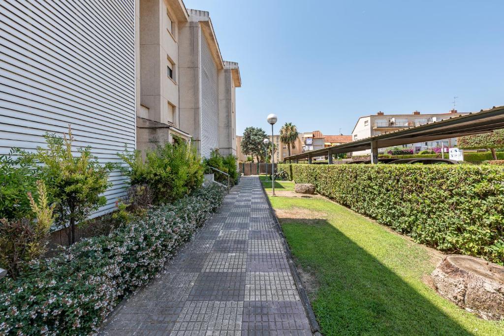 Zahrada ubytování Can Costelles Cambrils - Ático en primera línea con vistas, piscina y parking