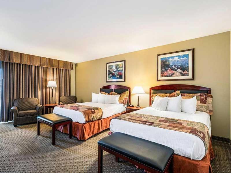 Postel nebo postele na pokoji v ubytování Winnemucca Inn & Casino